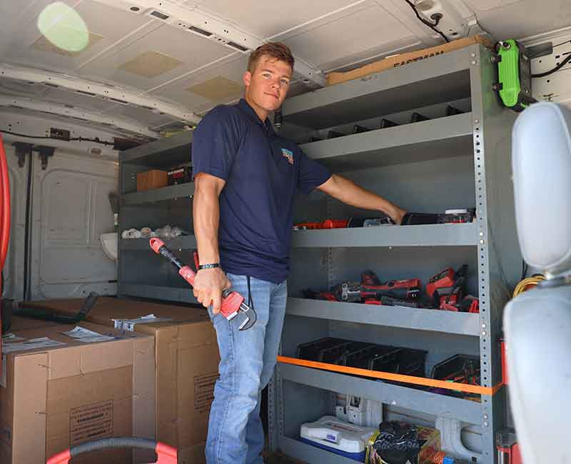 water heater man technician ready for maintenance on water heater